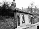 Nos. 101 and 103 Fox Street, Pitsmoor, demolished October 1960, with rear of housing on Andover Street in the background