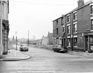 Franklin Street, Sharrow, from Sharrow Lane after the demolition of housing, pubs on corners are Cross Guns public house (right) and Franklin Hotel (left). Court No. 27 at rear of former back to backs on right