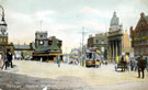Fitzalan Square, Market Street, left, Omnibus Waiting Room and Fitzalan Market Hall, centre, Bell Hotel, Wonderland Entertainment Booth and Birmingham District and Counties Banking Co. Ltd., right