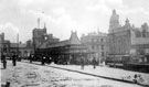 View: s16028 Fitzalan Square from Market Street (later became part of Fitzalan Square), omnibus waiting rooms, centre, Fitzalan Market Hall, Birmingham District and Counties Banking Co. Ltd. and General Post Office (Haymarket) in background