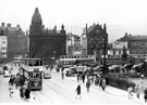 High Street/Fitzalan Square towards Commercial Street and Gas Company Offices, premises include (left-right), Barclays Bank, News Theatre (former Electra Palace) and Bell Hotel, undeveloped site in foreground was the bombed Marples Hotel