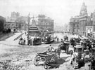 Fitzalan Square looking towards Fitzalan Market Hall and Haymarket 1895-1915, cab stand, foreground, Omnibus Waiting Room, centre, General Post Office (Haymarket), Birmingham District and Counties Banking Co. Ltd. and Wonderland entertainment boo