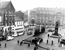 View: s16070 Fitzalan Square from High Street, Bell Hotel, No. 9 The Sleep Shop, bedding retailers, left, General Post Office, Baker's Hill, centre and King Edward VII Memorial, right