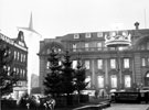 View: s16072 Fitzalan Square showing Christmas decorations, General Post Office, Baker's Hill and No.11 Henry Wigfall and Son Ltd., house furnishers in background