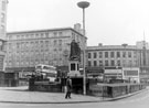 View: s16076 Fitzalan Square looking towards High Street, premises include Nos. 59 - 65 C and A Modes Ltd., No. 73 W. Barratt and Co. Ltd., boot and shoe dealers, No. 75 G. A. Dunn and Co. Ltd., hatters, No. 77 Newmans (Provincial) Ltd., costumiers