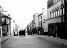 View: s16196 Charles Street, looking towards junctions of Union Lane (right) and Norfolk Lane (left), Nos. 60 - 64 Foxon and Robinson Ltd., timber merchants and No. 72 Roebuck Tavern, right, No. 69 Minerva Tavern, left