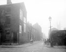 Nos. 24 - 36, left, and Nos. 23 and 25, right, George Lane at the junction of Arley Street, looking towards St. Mary's Church. Court Nos 7 and 5 at rear of property on left