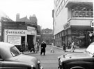 Looking towards No. 35 George Street, from High Street, Nos. 36 and 38, former premises of Gerrards, ladies outfitters and Nos. 30 - 34 Saxone Shoe Co. Ltd., boot dealers