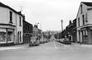 Nos. 84 - 86 Langton and Sons Ltd., boot and shoe dealers and Nos. 80 - 82 Blanchards Ltd., house furnishers, Infirmary Road looking down Bedford Street with Joseph Tomlinson and Sons Ltd. on the left