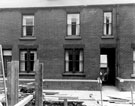 Roadworks outside terraced housing on Greenland Road near the junction with Coleford Road, Darnall