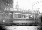 View: s16446 First Rotherham Corporation Tram Service Car into Fitzalan Square, Tinsley and Sheffield Tram showing the Clock Tower of the Tram Shelter behind