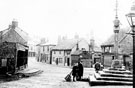 Market Square looking towards Market Place, Woodhouse. Market Cross, right. The cross was erected in 1775 by Joshua Littlewood. A sun dial and weather vane were added in 1826