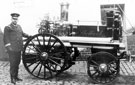 View: s16675 Inspector Outram beside No. 2 Pump (paraffin), West Bar Fire Station