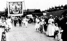 Enid Fox, last Union Queen of Darnall Baptist Church, on the Whit Walk near the entrance of High Hazels Park, Senior Road showing rear of properties on Huntsman Road and Elmham Road