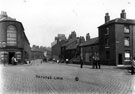 No. 53 S.E. Thompson Ltd., grocer, Harvest Lane at the junction with Neepsend Lane/ Burton Road (right) and Rowland Street (left), entrance to the Wesleyan Mission Room is visible (between two sloping walls, right)