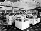 Staff assembled at the check-outs of the redesigned Firth Park Brightside and Carbrook Co-op, (No. 105 Hucklow Road but customer entrance fronting on to Firth Park Road)
