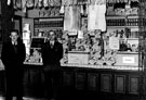 Unidentified branch of Stocksbridge Co-operative Society showing 'Spel' display (Co-op brand of washing powder) based on popular (in late fifties) television programme 'What's My Line' Unidentified branch of Stocksbridge Co-operative Society showing 'Spel' display (Co-op brand of washing powder) based on popular (in late fifties) television programme 'What's My Line'