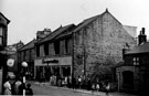 Stocksbridge Co-operative Society, Manchester Road, Deepcar, after the fire which severely damaged it, King and Miller public house, right