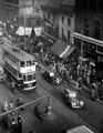 Elevated view of Haymarket, Norfolk Market Hall, top left corner, Nos. 20 and 22 Burton Montague, Ltd., tailors, No. 18 Lipton Ltd., tea merchants, No. 16, William Timpson, Ltd., boot dealers