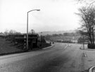 View: s17150 Looking South East along Herries Road at the junction with Norwood Road showing the bus stop near the entrance to City General Hospital (later Northern General) and prefab housing on the right