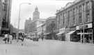 View: s17213 High Street looking towards Telegraph and Star offices, Kemsley House, premises on right include Central Chambers, No. 41 John Collier, tailors, No 43 Swears and Wells Ltd., furnishers, No. 45 H. Samuel Ltd., jewellers, No. 47 Manfield and Son