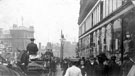 High Street outside Nos. 44 - 64 John Walsh Ltd., general drapers, Fitzalan Market Hall in distance