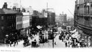 View: s17233 Elevated view of High Street, Tram Nos. 173 and 176 in foreground, premises on left include Castle Chambers and old Telegraph Offices, Foster's Buildings, right
