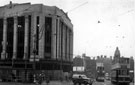 High Street looking towards Commercial Street, Nos. 51 - 55 former premises of Burton Montague Ltd., tailors (fifteen years after the Blitz)