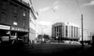 View: s17278 General view of High Street looking towards Market Place and the shell of former Burton Montague Ltd., tailors (bombed in World War II)