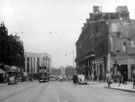 View: s17321 High Street, Nos. 36 - 38 Gerrards, ladies outfitters, Nos. 44 - 64 former premises of J. Walsh Ltd., department store (3 years after Blitz), former premises of Burton Montague in background