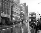 View: s17363 High Street road works, No. 42 Westminster Bank, and No. 50 John Walsh Ltd., department store, left