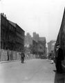 Holly Street looking towards West Street, construction of Town Hall, right, premises on left include Livingstone Works, former Bethel Chapel Sunday School, Telephone Exchange in distance