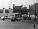 Howard Street, looking towards Sheaf Square fountain and Sheaf House, premises include No. 45 The Cossack public house, No. 53 Milners, house furnishers, No. 57 Howard Hotel