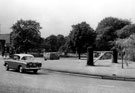 Hunter's Bar roundabout, Ecclesall Road, showing the old toll house gate and gate posts, Endcliffe Park in the background