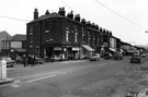 Infirmary Road at the junction with Portland Street showing shops including 'The Spot' bargain centre premises
