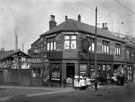 Prince M. Sunderland, optician and watch maker, Nos. 4 - 6 Langsett Road and the junction of Flora Street, showing chimney pots stacked in business at rear of premises