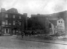 Johnson Street from Stanley Street, showing old works formerly known as Nursery Steam Grinding Wheel also known as Shiloh Works. Occupied at time of photograph by Strongs British Twist Drill Ltd. No 27, Johnson Street, grocers (on left). Johnson Street from Stanley Street, showing old works formerly known as Nursery Steam Grinding Wheel also known as Shiloh Works. Occupied at time of photograph by Strongs British Twist Drill Ltd. No 27, Johnson Street, grocers (on left).