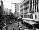 View: s17564 King Street, 1961-1962, looking towards Market Place and T. B. and W. Cockayne, department store, premises on right include Kings Chambers and Pearl Assurance House