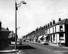 View: s17580 Shops and businesses including the dental surgery (extreme right), Langsett Road, from the junctions with Ash Street (right) and Burgoyne Road, 1969-72