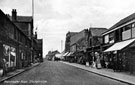 View: s17776 Manchester Road, Stocksbridge premises on left include T. Farr, outfitters and Co-operative Society, Central Stores, premises on right include T. Abson, stationery and hardware store and Bramwell, boot and shoe shop