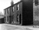 No. 9, etc., Manell Terrace looking towards the rear of the Talbot Inn (right), Hoyle Street