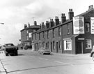 View: s17864 No. 105 White Swan Hotel (corner of Jenkin Road) and Nos. 107 - 121 (hairdressers), Meadowhall Road showing the junction with Hayland Street