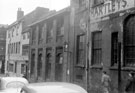 Milk Street from Norfolk Street, Nos. 43 - 45 Harry Hartley and Son Ltd., hardware store, right (former Milk Street Academy)