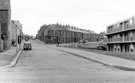 Montfort Road (bottom to top of picture) with terraced housing on Verdon Street (centre to right of picture) and new flats, extreme right