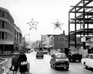 View: s18043 Moorhead looking towards The Moor showing Christmas Decorations, construction of Pauldens Ltd., right