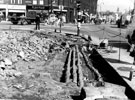 Road works at junction of Ecclesall Road and The Moor, No. 2 Ecclesall Road, Henry Playfair Ltd., shoe shop