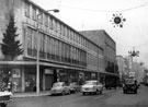 Christmas decorations on The Moor, shops include No 102, Sheffield and Ecclesall Co-operative Society Ltd.