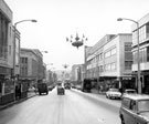 View: s18060 Christmas decorations on The Moor, Nos. 28 - 30 Freeman Hardy and Willis, boot and shoe dealers, Roberts Brothers (Sheffield) Ltd., Rockingham House, department store