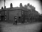 Moore Street at junction with Young Street, showing terraces and back to back houses. Court No. 4 at rear of back to backs.