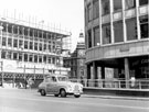 Moorhead looking towards Furnival Gate, construction of offices and shop units and former Newton Chambers, then owned by P.W. Lacey Ltd., footwear and outfitters